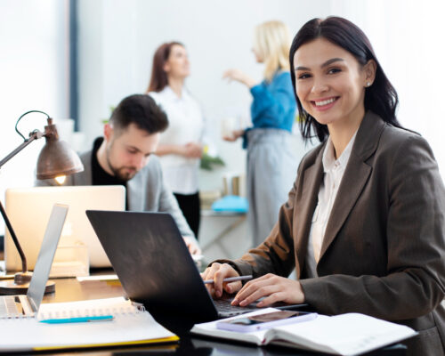 medium-shot-woman-working-laptop medium-shot-woman-working-laptop